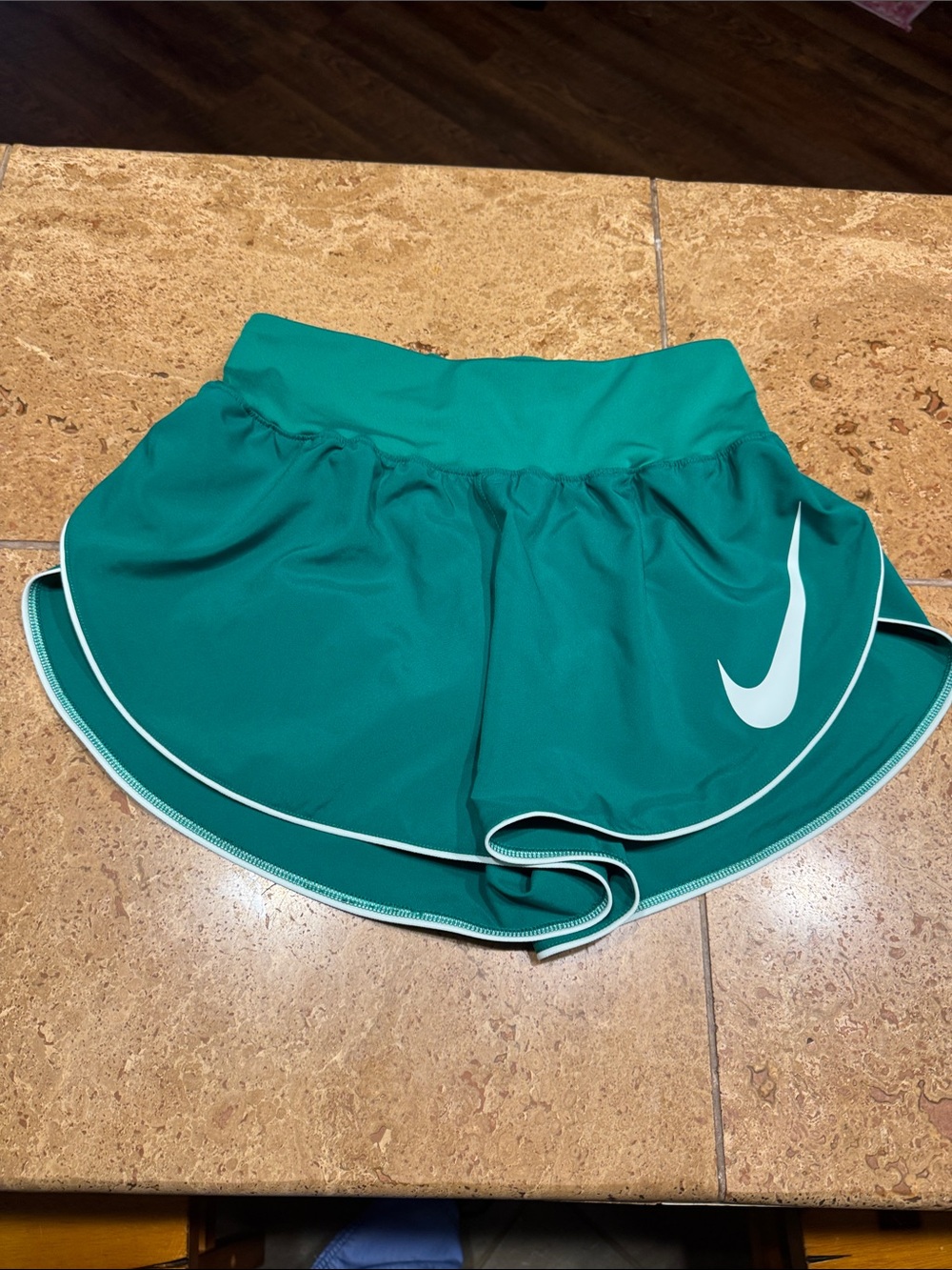Nike Women's Teal Athletic Shorts with White Swoosh and Piping